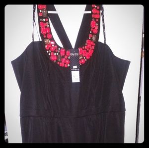 Peplum dress with beaded neckline